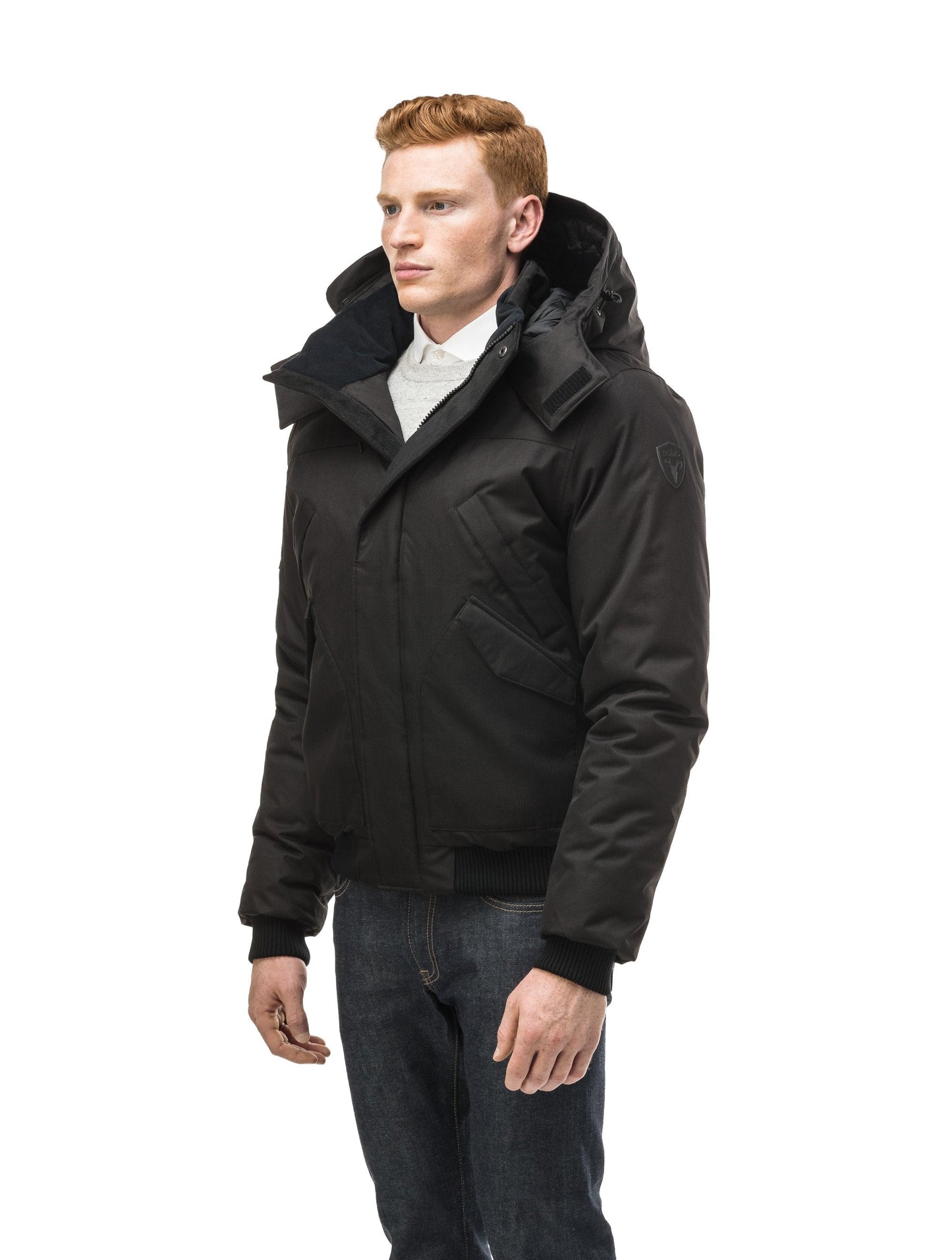 Men's classic down filled bomber jacket with a down filled hood that features a removable coyote fur trim and concealed moldable framing wire in Black