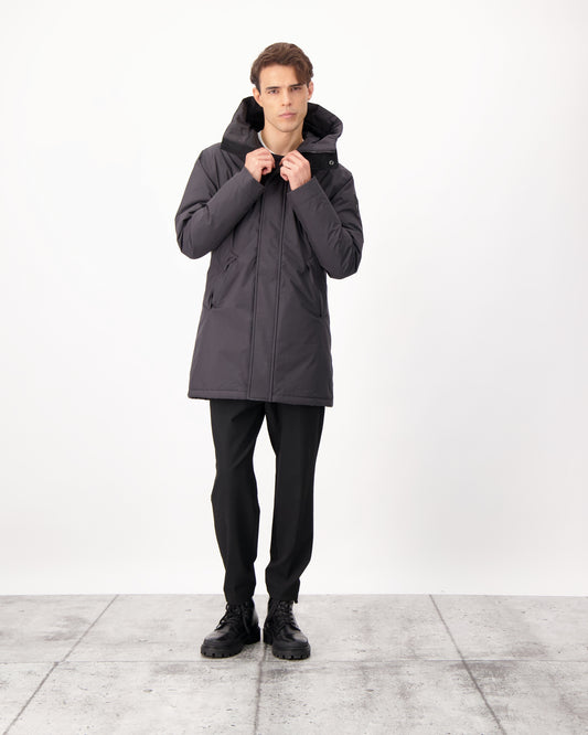 Pierre Men's Jacket in thigh length, Canadian white duck down insulation, non-removable down-filled hood, angled waist pockets, centre-front zipper with wind flap, and elastic ribbed cuffs, in 3L Black