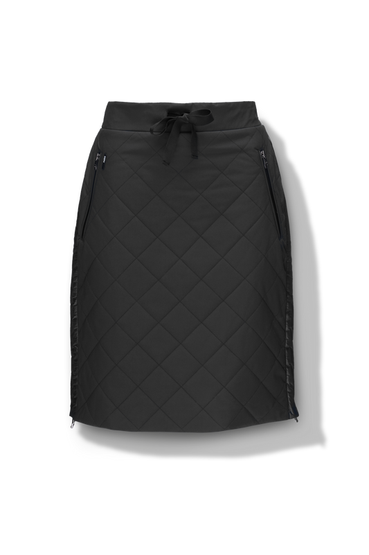 Phora Women's Tailored Skirt in knee length, premium stretch ripstop and contrast cire technical nylon taffeta fabrication, premium 4-way stretch, water resistant Primaloft Gold Insulation Active+, elasticated waistband with grosgrain ribbon drawstrings, two zipper pockets at waist, and zipper closure gusset at side seams, in Black + Black