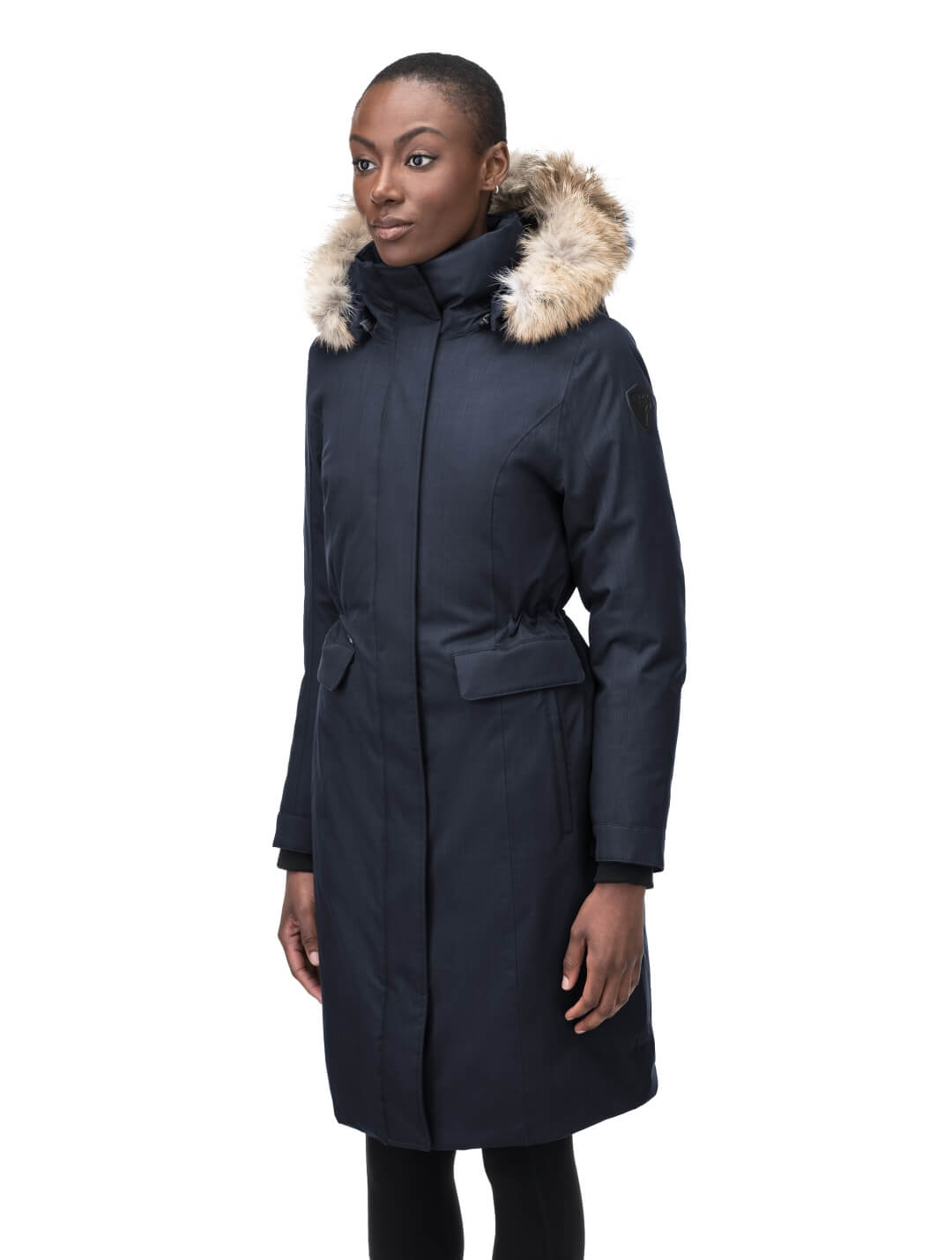 Zenith Ladies Knee Length Parka in knee length, Canadian duck down insulation, removable hood with removable fur ruff trim, and two-way front zipper, in Navy