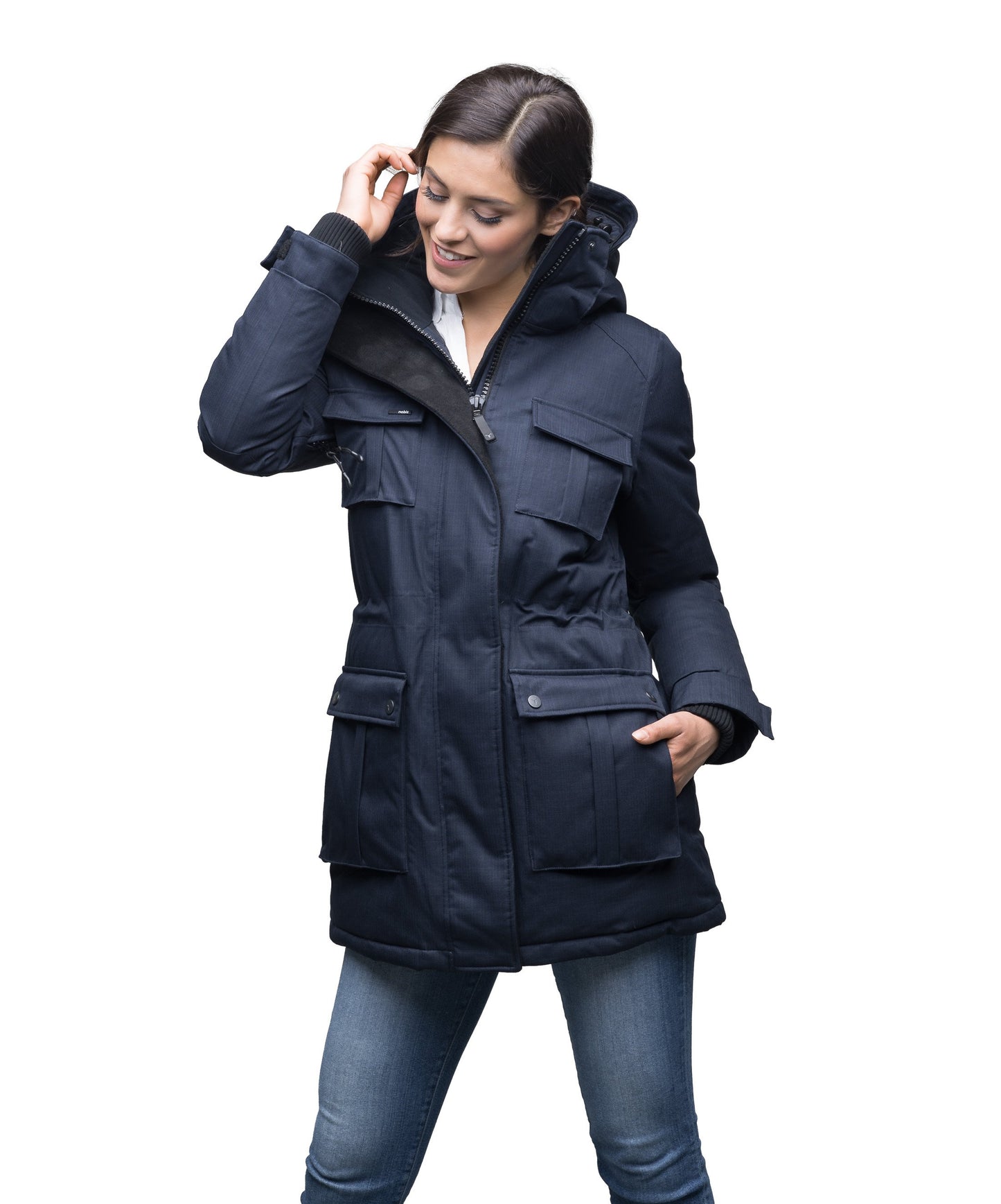 Women's down filled thigh length parka with four pleated patch pockets and an adjustable waist in CH Navy