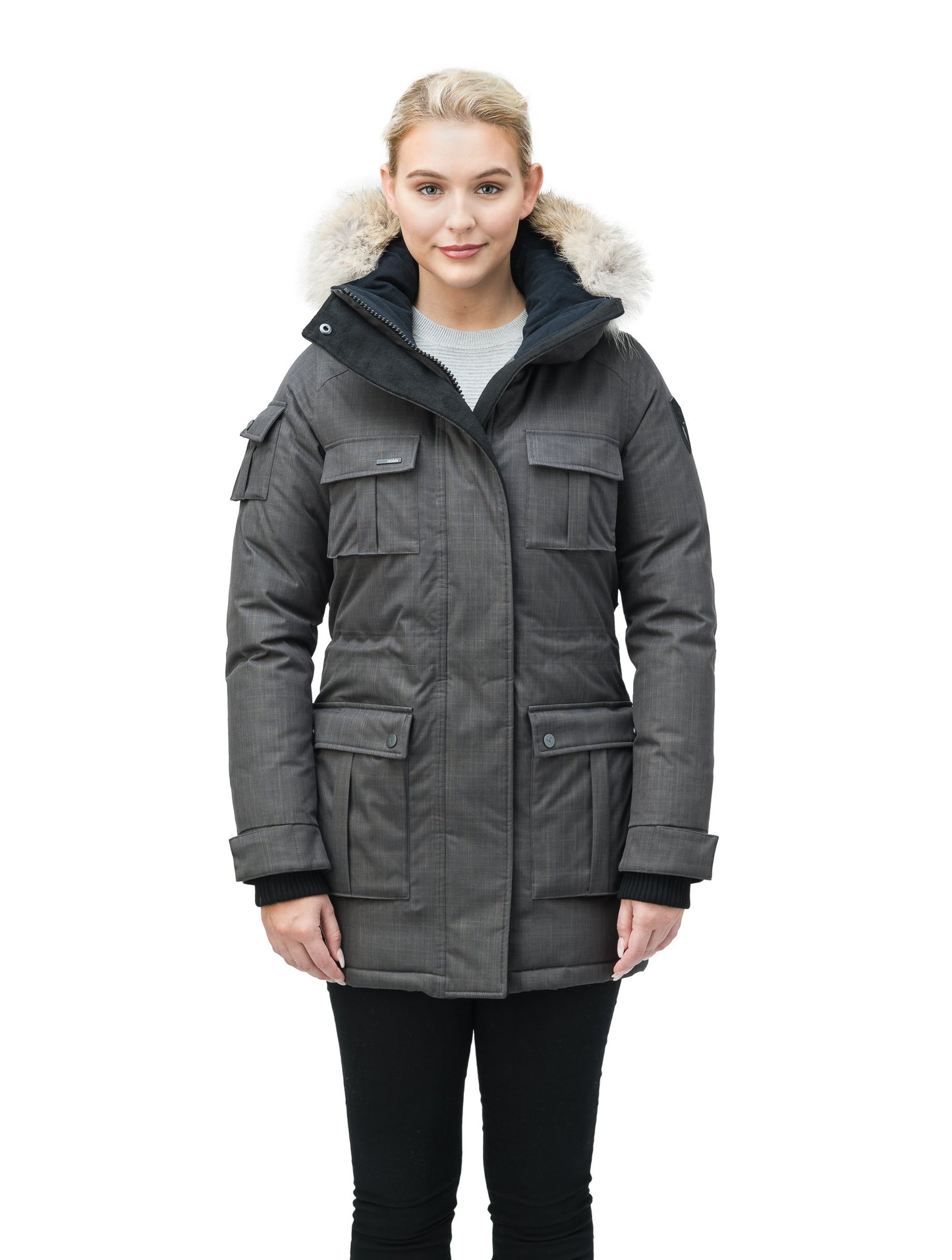 Women's down filled thigh length parka with four pleated patch pockets and an adjustable waist in CH Steel Grey