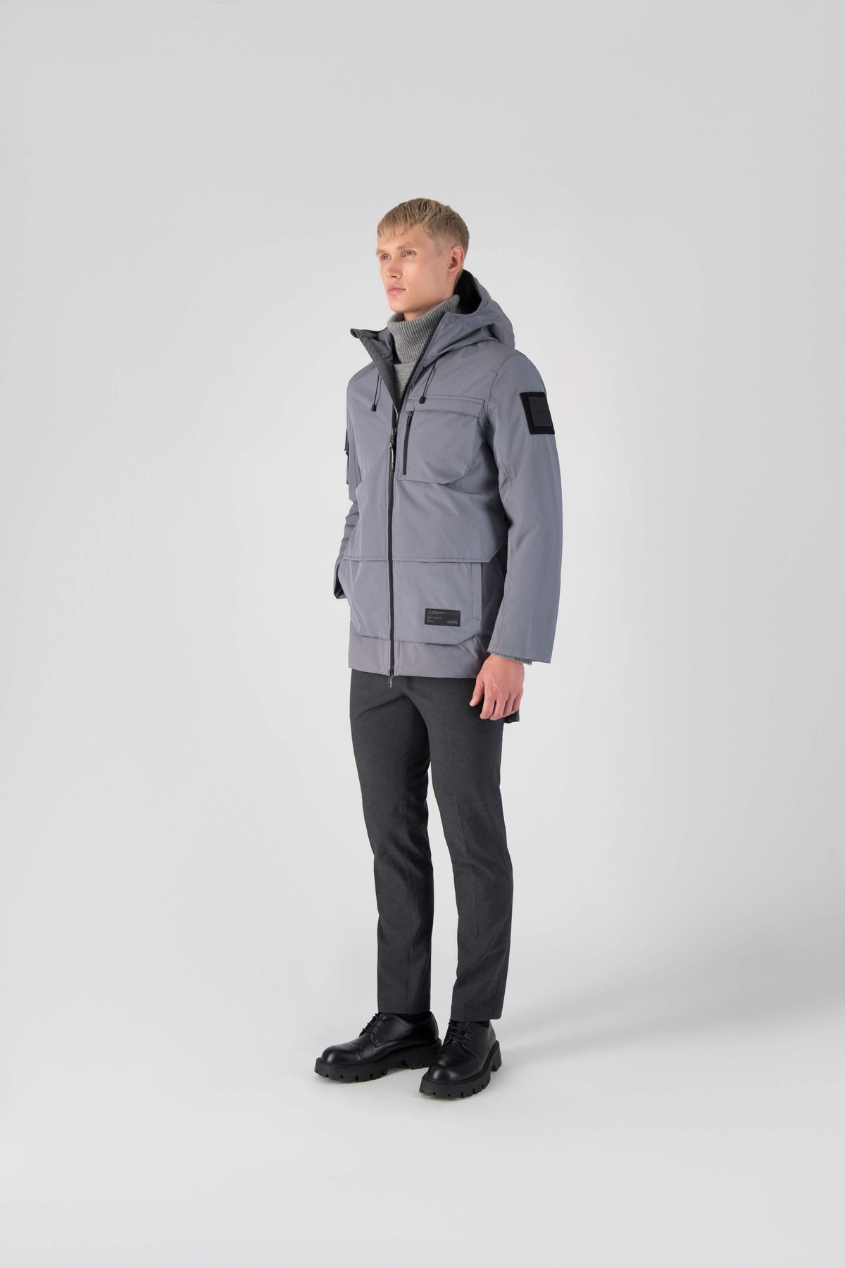 Alta Men's Performance Shell Jacket in hip length, Primaloft Gold Insulation Active+, chest and waist pockets, ventilation under arms, reflective detailing on hood and back, two-way front zipper, and non-removable hood with adjustable drawstrings, in Concrete