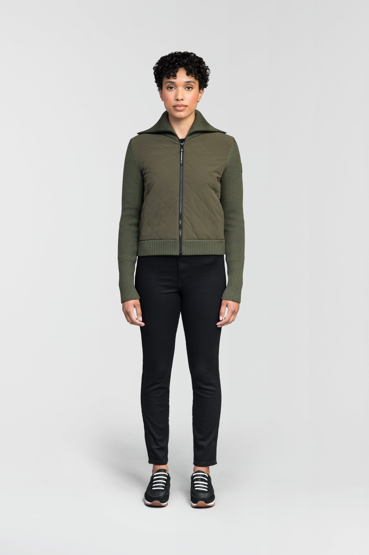 Ada Ladies Quilted Full Zip Sweater in hip length, PrimaLoft Gold Insulation Active+, Durable 4-Way Stretch Weave quilted torso, Merino wool knit collar, sleeves, back, and cuffs, two-way front zipper, and hidden waist pockets, in Fatigue