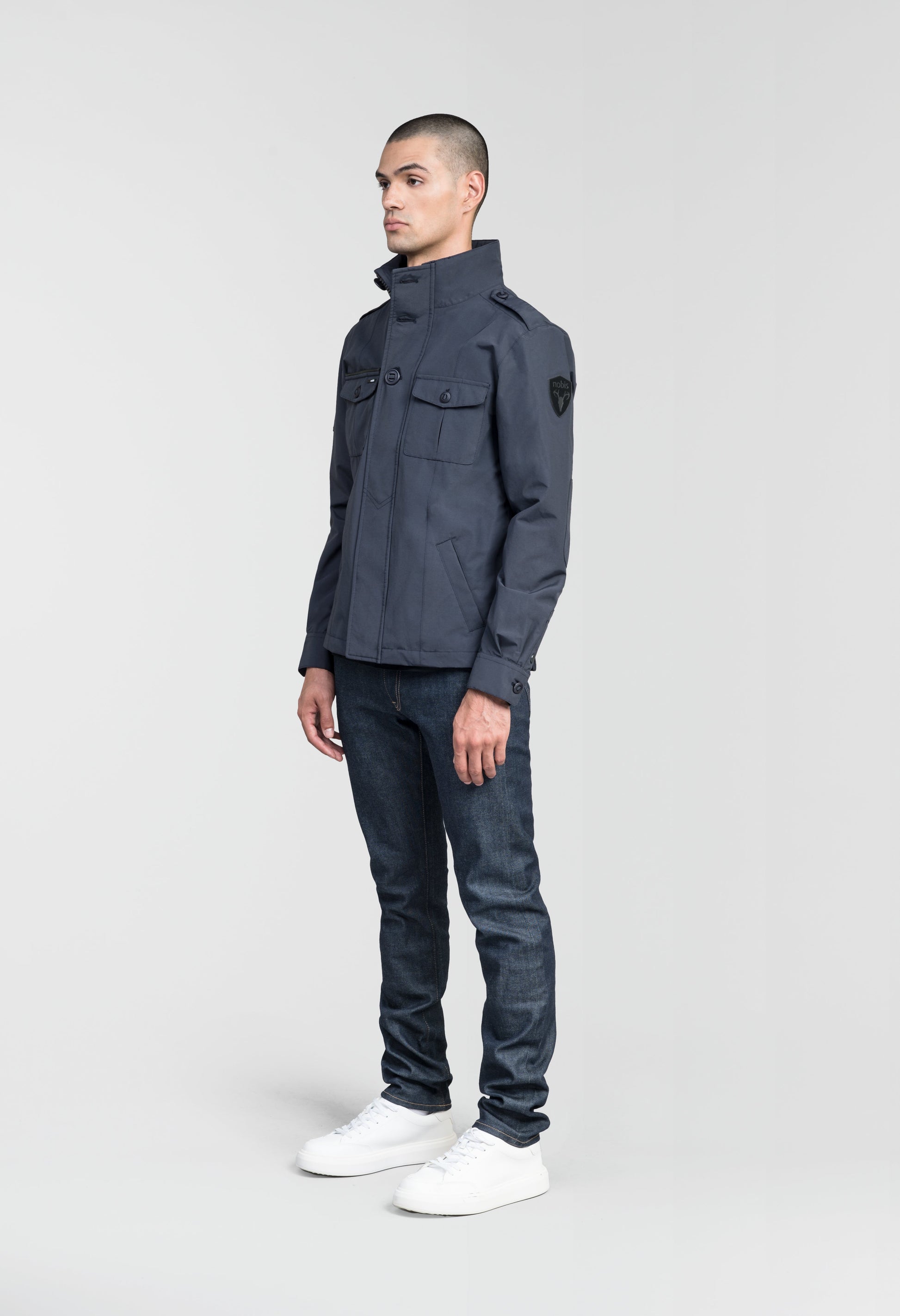Men's waist length military style jacket in Navy