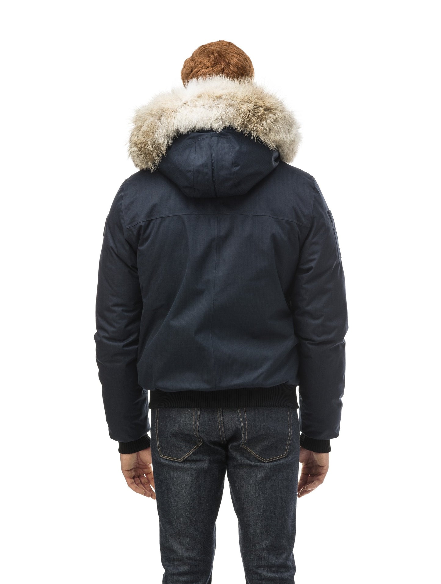 Men's classic down filled bomber jacket with a down filledÃƒÆ’Ã†â€™Ãƒâ€ Ã¢â‚¬â„¢ÃƒÆ’Ã¢â‚¬Â ÃƒÂ¢Ã¢â€šÂ¬Ã¢â€žÂ¢ÃƒÆ’Ã†â€™Ãƒâ€šÃ‚Â¢ÃƒÆ’Ã‚Â¢ÃƒÂ¢Ã¢â€šÂ¬Ã…Â¡Ãƒâ€šÃ‚Â¬ÃƒÆ’Ã¢â‚¬Â¦Ãƒâ€šÃ‚Â¡ÃƒÆ’Ã†â€™Ãƒâ€ Ã¢â‚¬â„¢ÃƒÆ’Ã‚Â¢ÃƒÂ¢Ã¢â‚¬Å¡Ã‚Â¬Ãƒâ€¦Ã‚Â¡ÃƒÆ’Ã†â€™ÃƒÂ¢Ã¢â€šÂ¬Ã…Â¡ÃƒÆ’Ã¢â‚¬Å¡Ãƒâ€šÃ‚Â hood that features a removable coyote fur trim and concealed moldable framing wire in Navy