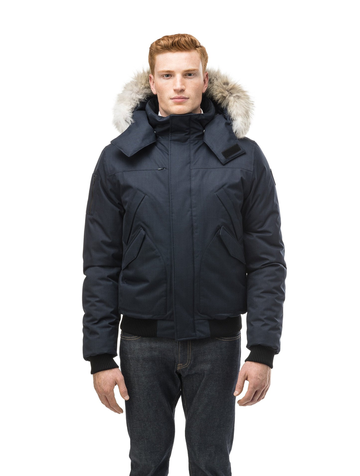 Men's classic down filled bomber jacket with a down filledÃƒÆ’Ã†â€™Ãƒâ€ Ã¢â‚¬â„¢ÃƒÆ’Ã¢â‚¬Â ÃƒÂ¢Ã¢â€šÂ¬Ã¢â€žÂ¢ÃƒÆ’Ã†â€™Ãƒâ€šÃ‚Â¢ÃƒÆ’Ã‚Â¢ÃƒÂ¢Ã¢â€šÂ¬Ã…Â¡Ãƒâ€šÃ‚Â¬ÃƒÆ’Ã¢â‚¬Â¦Ãƒâ€šÃ‚Â¡ÃƒÆ’Ã†â€™Ãƒâ€ Ã¢â‚¬â„¢ÃƒÆ’Ã‚Â¢ÃƒÂ¢Ã¢â‚¬Å¡Ã‚Â¬Ãƒâ€¦Ã‚Â¡ÃƒÆ’Ã†â€™ÃƒÂ¢Ã¢â€šÂ¬Ã…Â¡ÃƒÆ’Ã¢â‚¬Å¡Ãƒâ€šÃ‚Â hood that features a removable coyote fur trim and concealed moldable framing wire in Navy