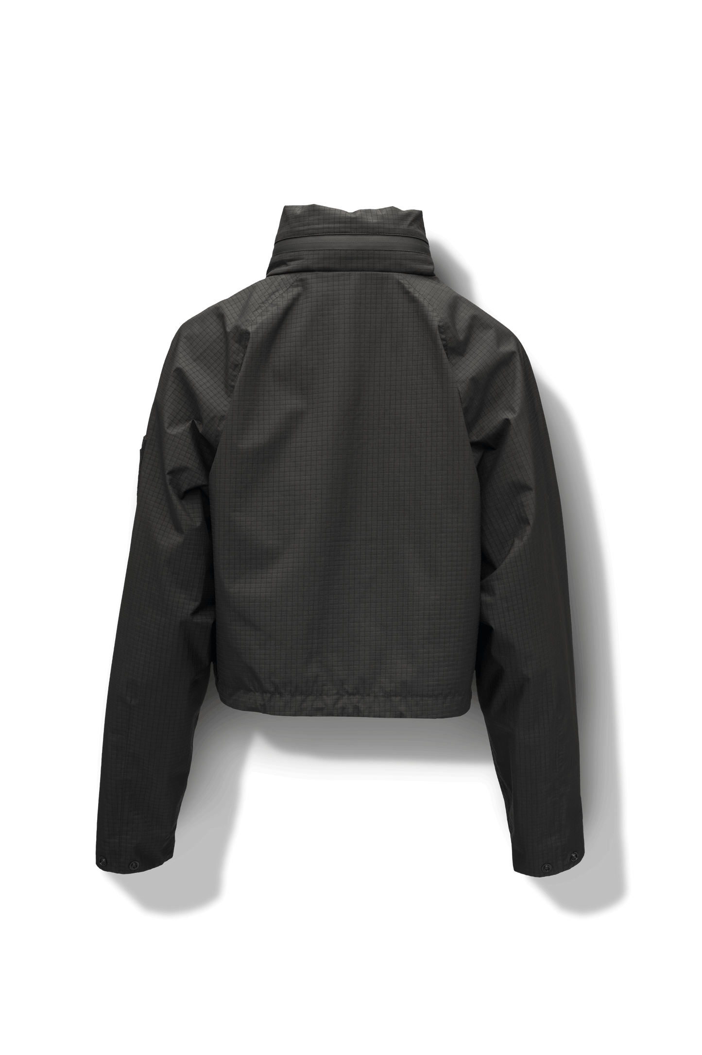 Epsie Women's Cropped Rain Jacket in Black crafted from premium recycled polyester ripstop with a DWR coating and taffeta nylon lining. Features a hidden packaway hood stored in the collar, two-way waterproof front zipper, seam-sealed construction, underarm zip ventilation, adjustable drawcord hem, zippered waist patch pockets, and an interior chest pocket for secure storage. Machine washable. Designed in Canada.