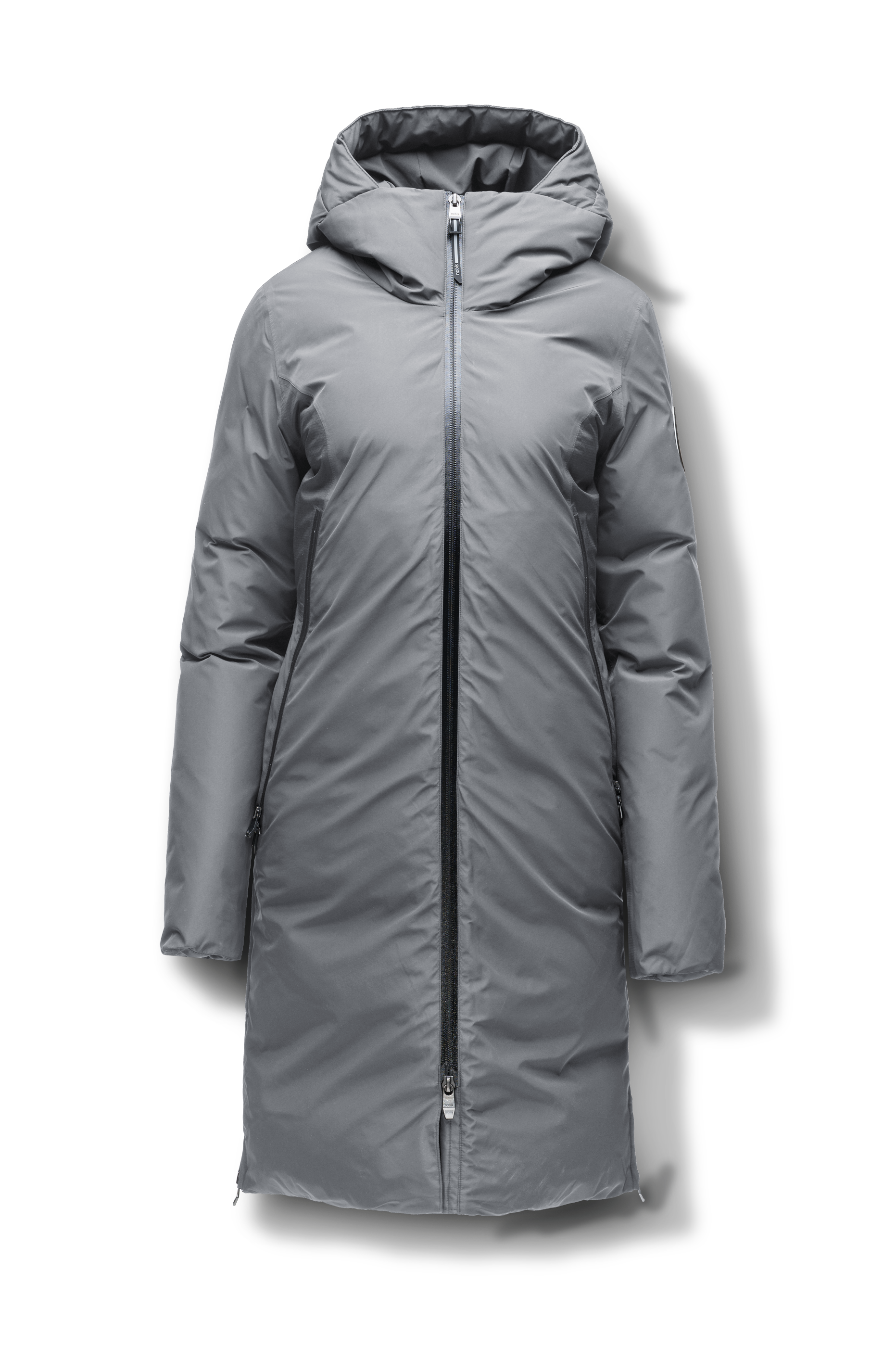 Inara Women's Performance Parka in knee length, premium 3-ply micro denier and stretch ripstop fabrication with DWR coating, Premium Canadian White Duck Down insulation, non-removable down-filled hood, centre front two-way zipper, large vertical zipper pockets along waist, zipper vents along bottom side hem, in Concrete