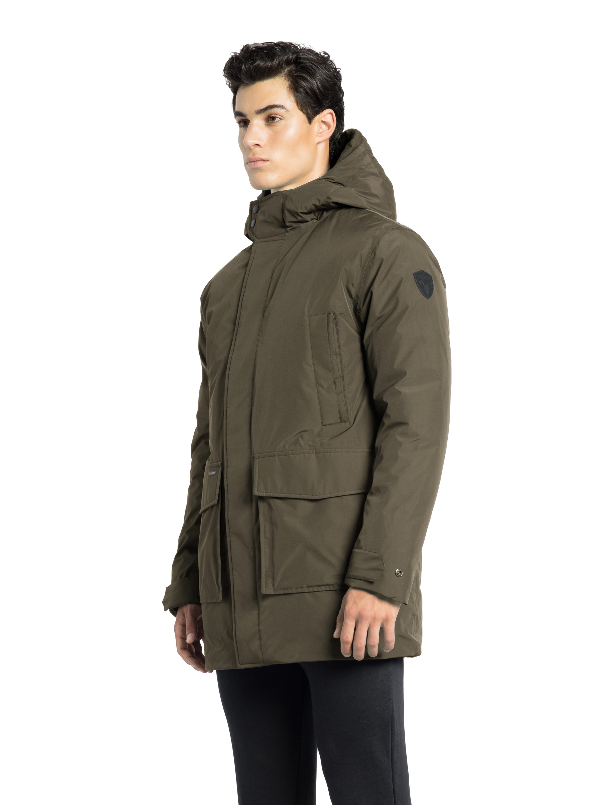 Kason Men's Light Down Parka in thigh length, premium 3-ply micro denier and stretch ripstop fabrication, Premium Canadian origin White Duck Down insulation, non-removable down-filled hood, two-way centre-front zipper, magnetic closure wind flap, fleece-lined pockets at chest and waist, flap pockets at waist, pit zipper vents, in Fatigue