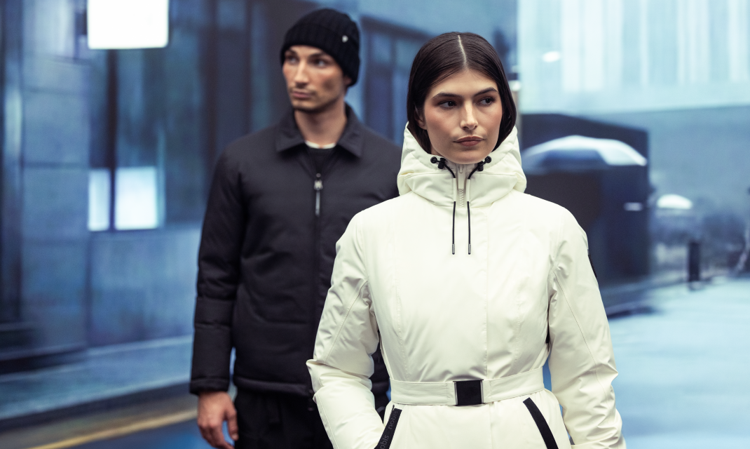 Man on left wearing Nobis Nicholas. Woman on right wearing Nobis Shaw.