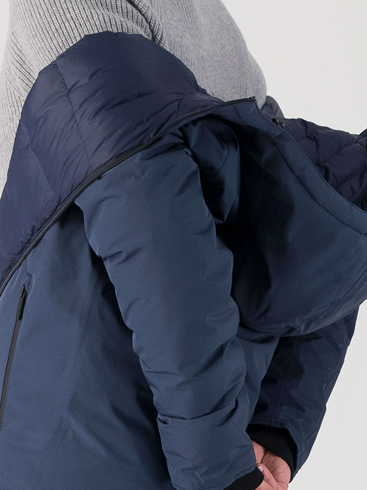 Hip length, reversible men's down filled jacket with removable hood in Marine