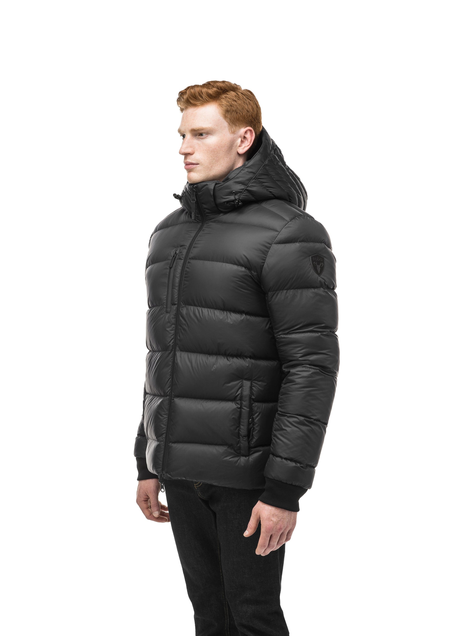 Hip length, reversible men's down filled jacket with removable hood in Black