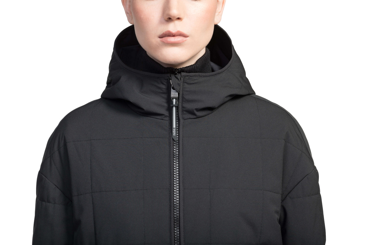 Radar Women's Performance Long Midlayer Jacket in long length, premium stretch ripstop and stretch Toray nylon fabrication, premium 4-way stretch, water resistant Primaloft Gold Insulation Active+, non-removable hood with adjustable draw cord, 2-way branded zipper at centre front, single welt pockets with magnetic closure at hips, elongated ribbed cuffs, grosgrain ribbon detail at shoulder and side seams, and snap closure side seam vent, in Black