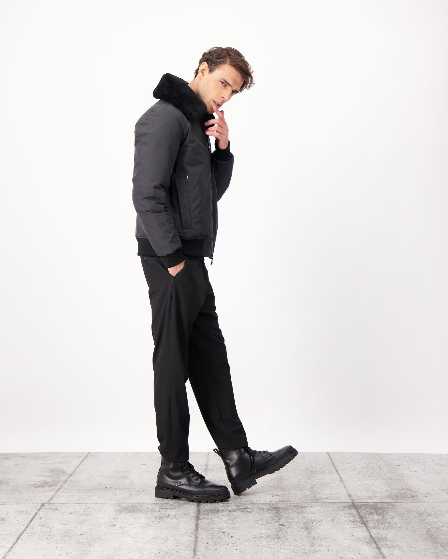 Sonar Men's Aviator Jacket in hip length, Canadian duck down insulation, removable shearling collar with hidden tuckable hood, and two-way front zipper, in Black