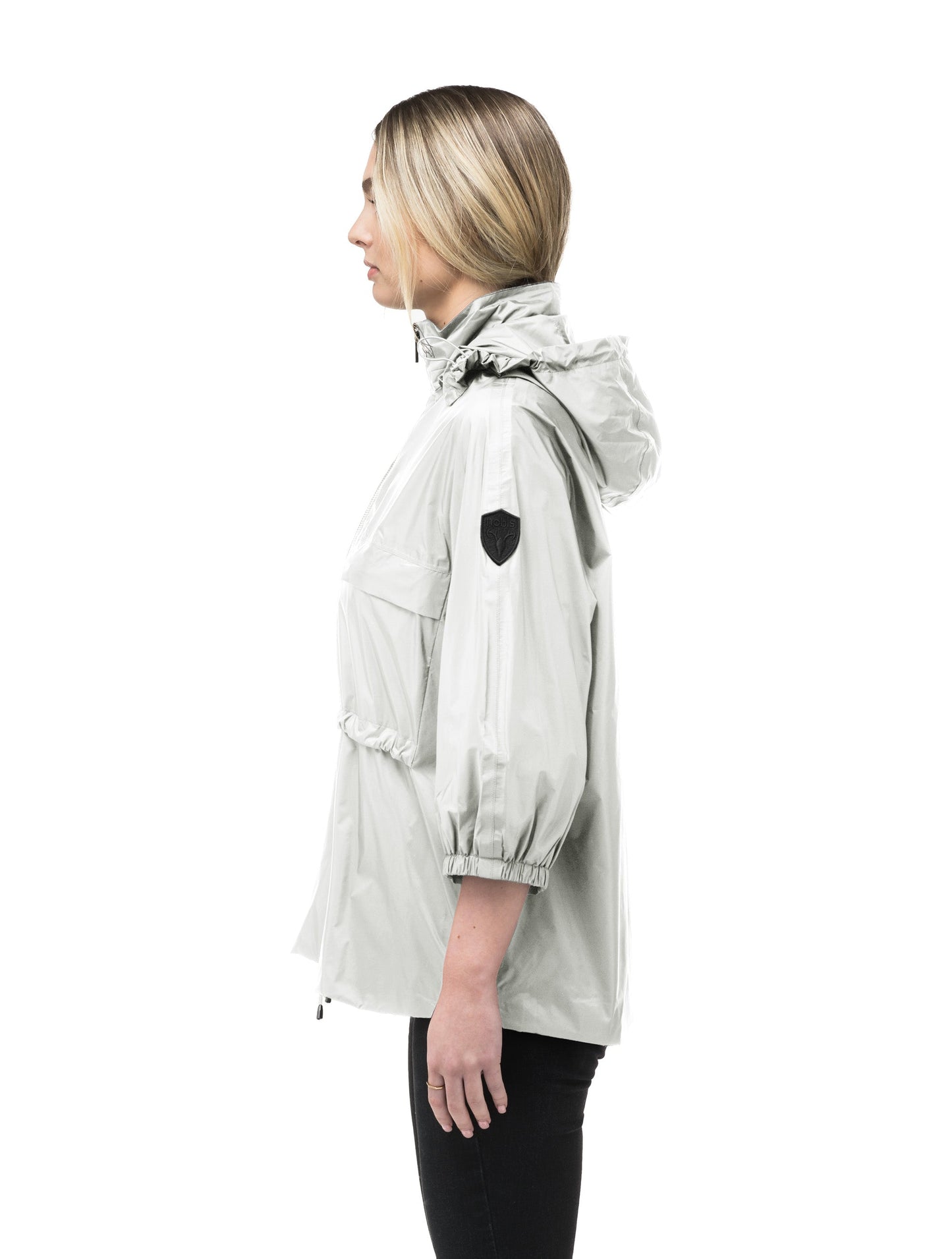 Women's waist length windbreaker with two chest pockets in Light Grey