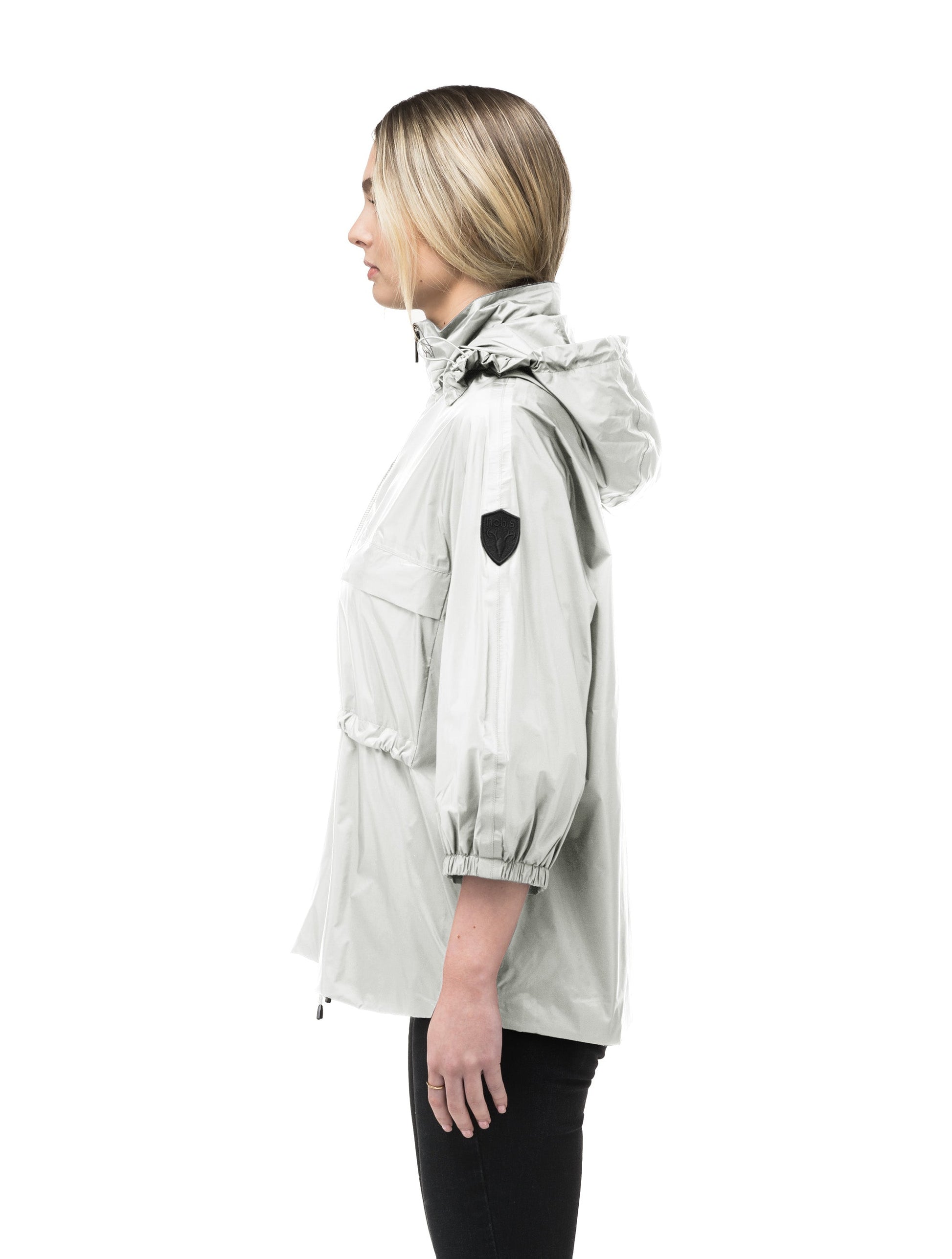 Women's waist length windbreaker with two chest pockets in Light Grey