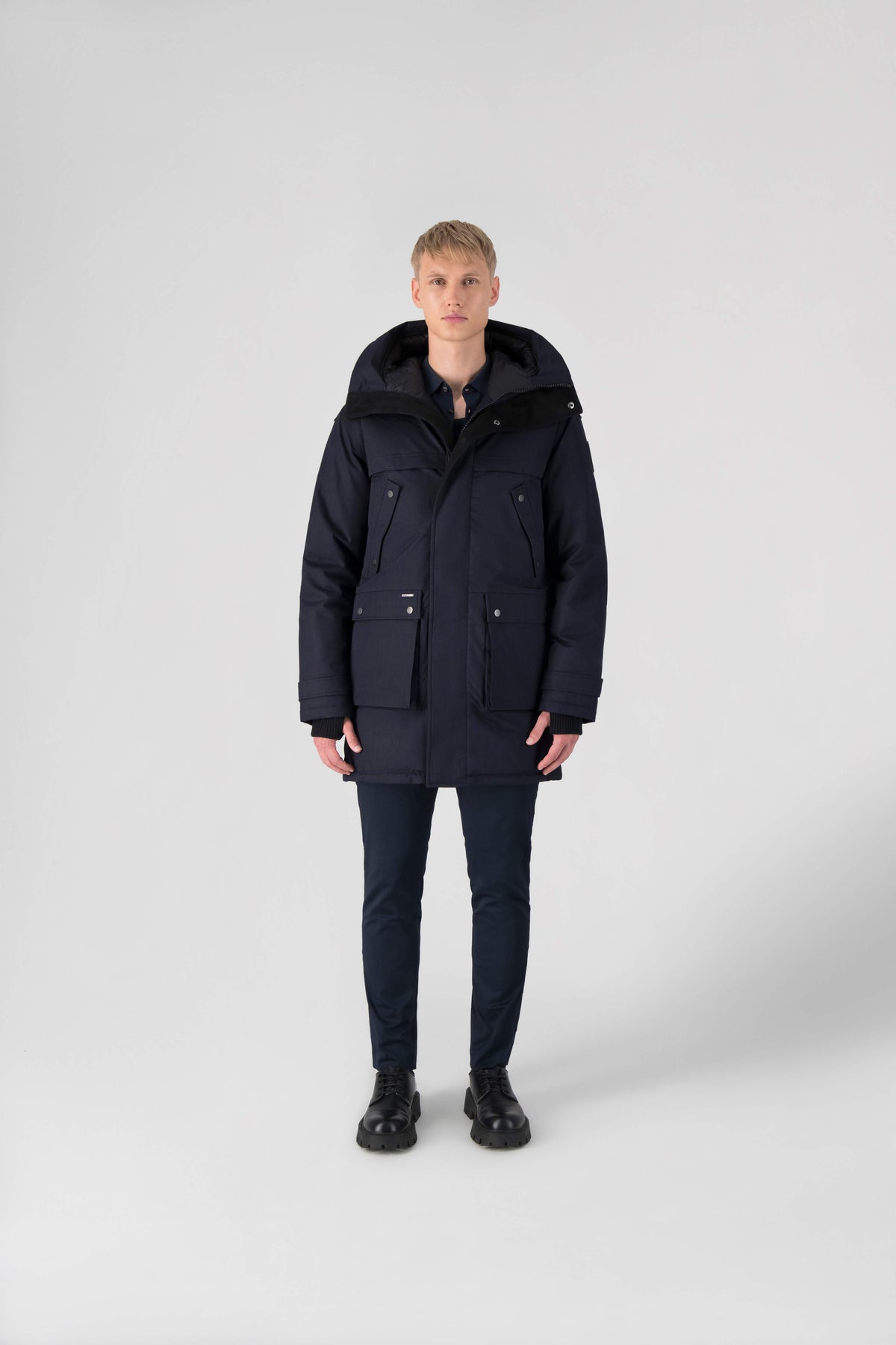 Men's Best Selling Parka the Yatesy is a down filled jacket with a zipper closure and magnetic placket in Navy