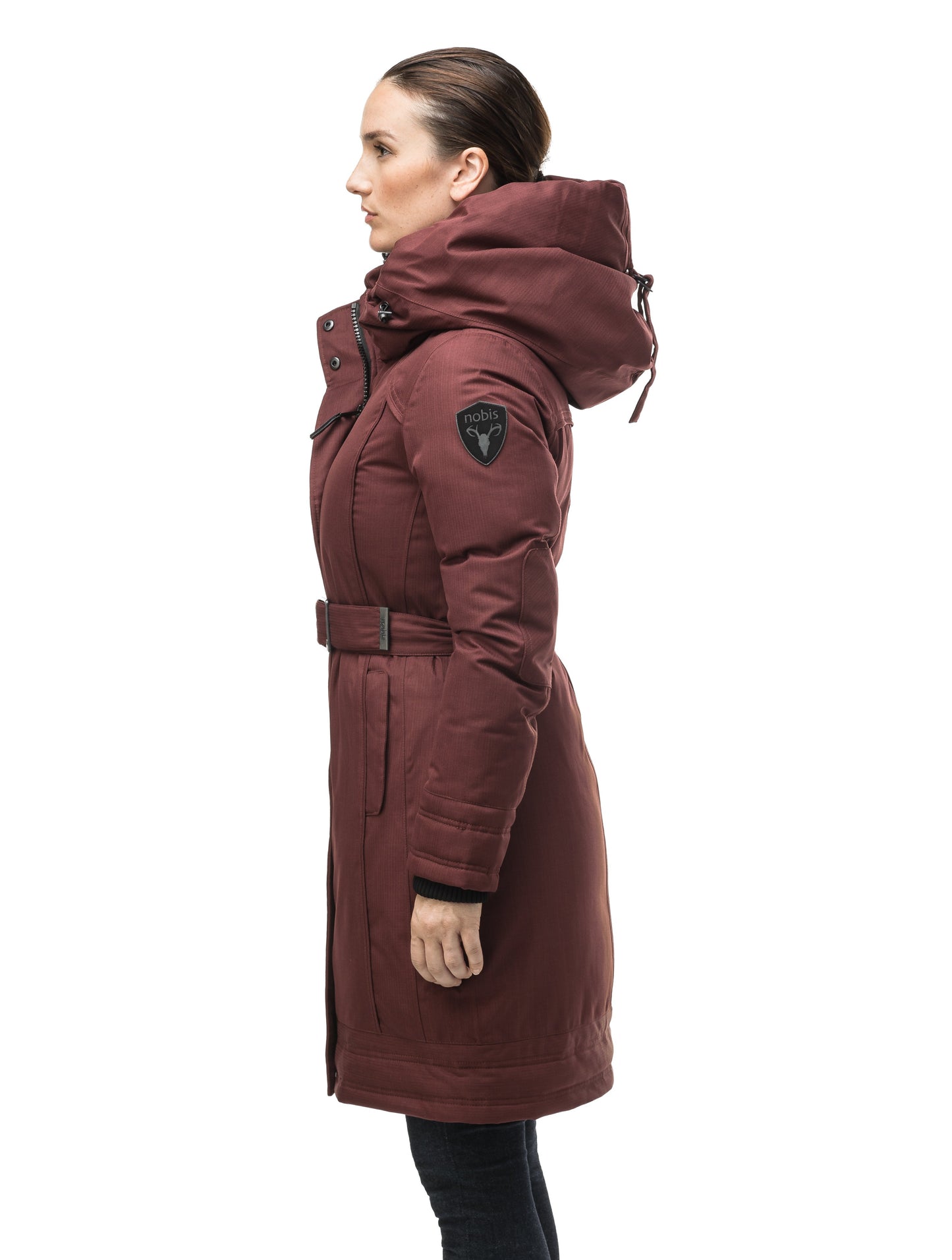 Women's Thigh length own parka with a furless oversized hood in CH Red Rum