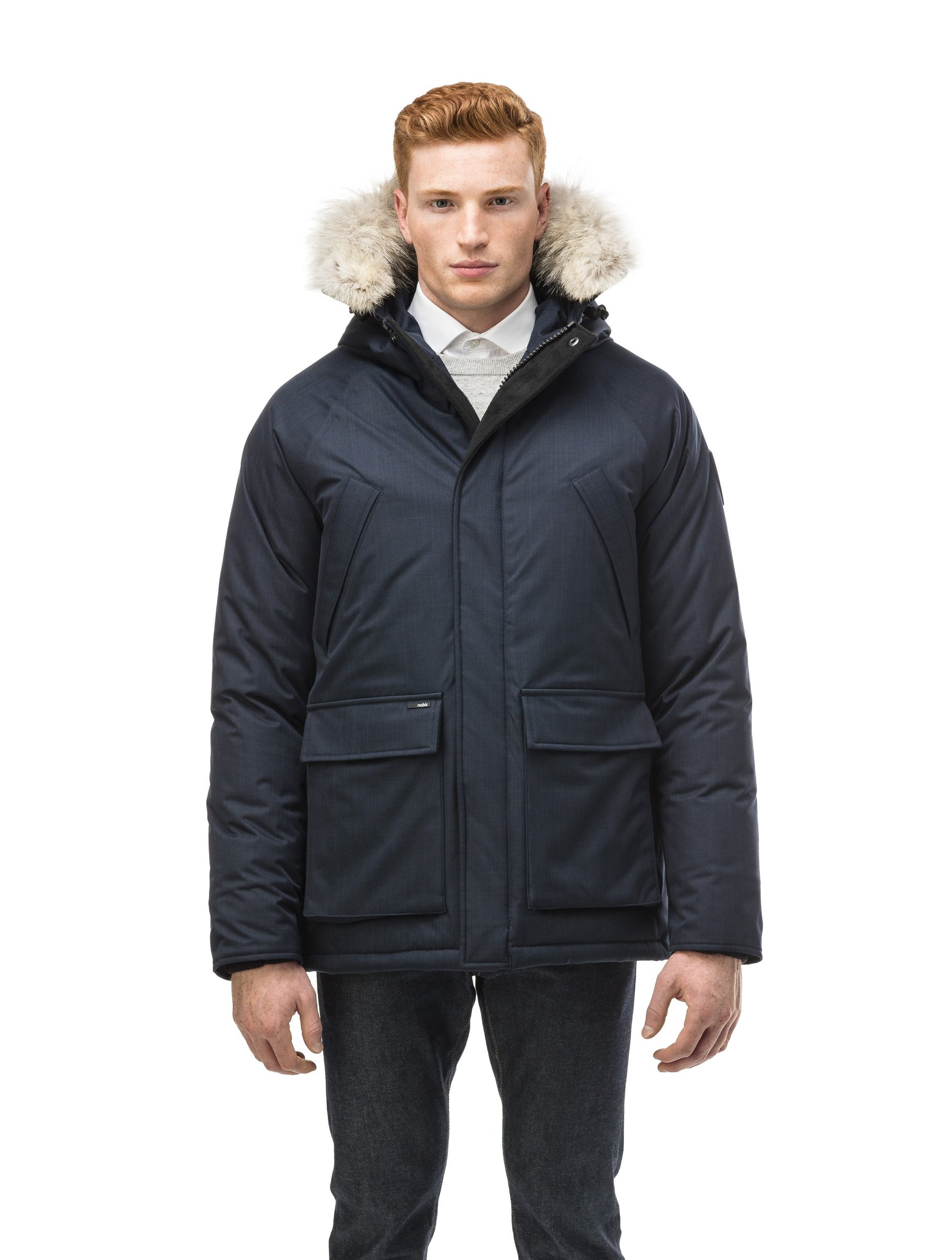 Men's waist length down filled jacket with two front pockets with magnetic closure and a removable fur trim on the hood in CH Navy